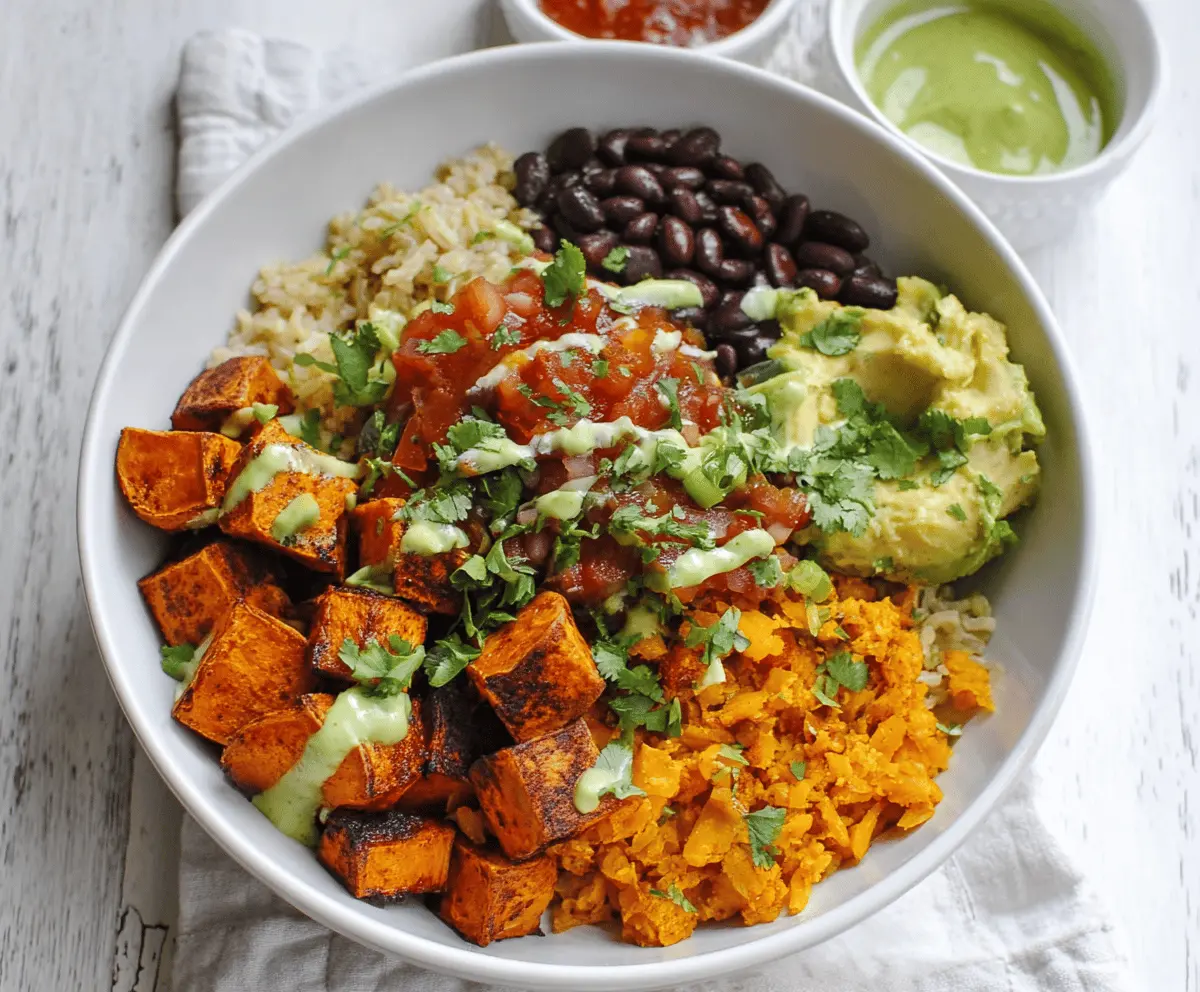 Delicious chipotle sweet potato burrito bowls with fresh vegetables and flavorful sauce.