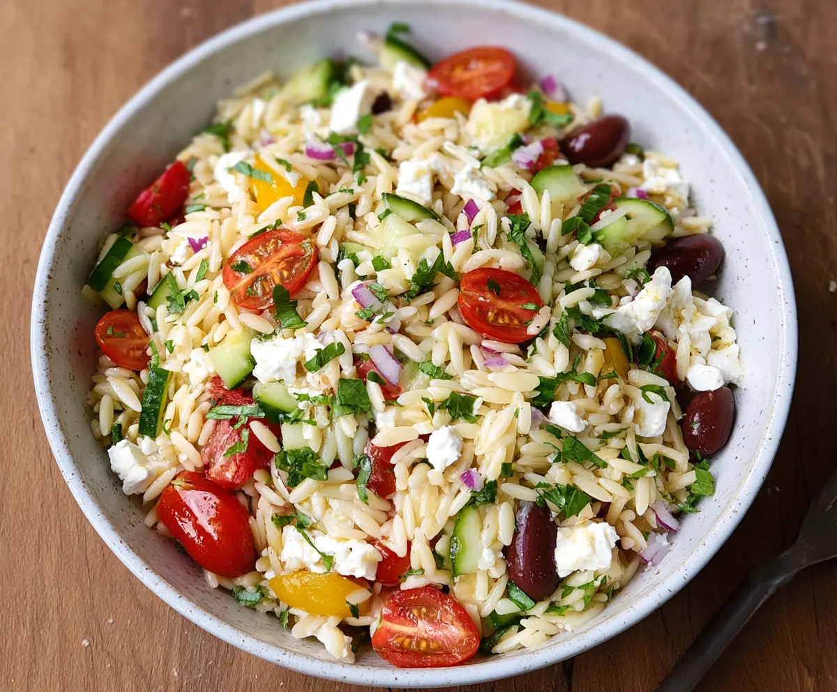Fresh Feta Orzo Salad with cherry tomatoes and herbs, perfect for a light, healthy meal